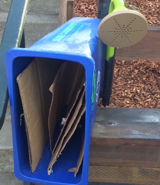 "Cardboard holding device and primitive communication system"