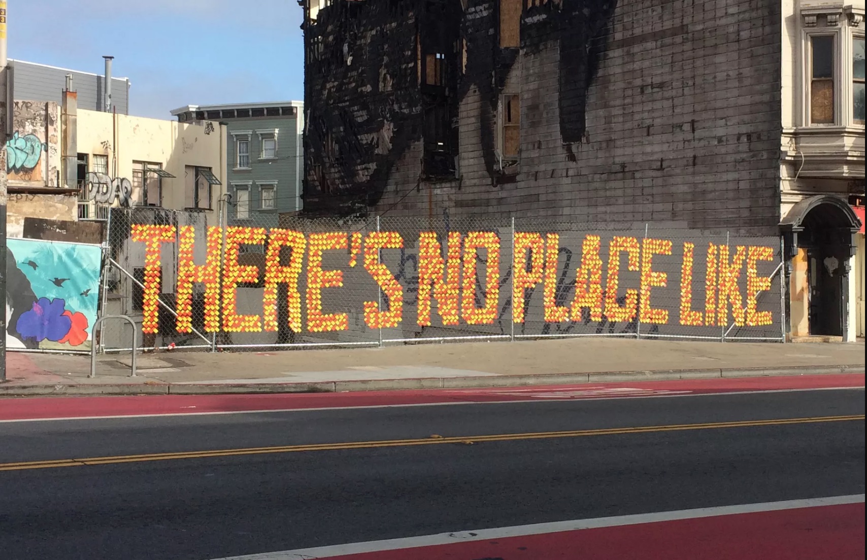 Chainlink Fence Art Installation Unites Neighbors Working to Rebuild |  Bernalwood